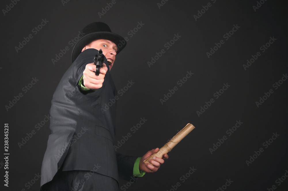 Retro style spy agent is shooting from a gun and run away with top secret compromising evidence documents isolated on the black background. Retro style spy agent is shooting from a gun and run away with top secret compromising evidence documents isolated on the black background.