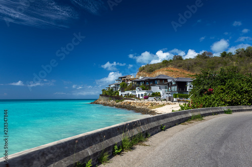 Road along a tropical beach at Antigua island in Caribbean