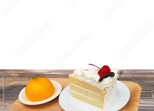  layer cake with berry on top and orange cake on wooden plate with copy space,sweet dessert photo