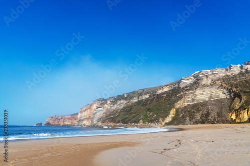 Nazare cliff in morning light  Portugal.