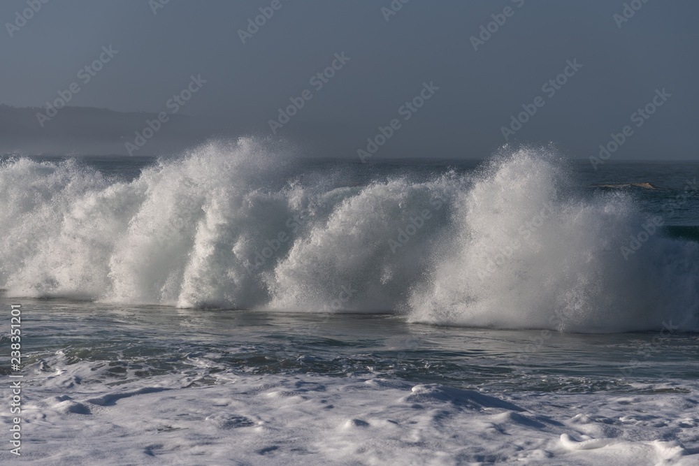 Atlantic wave on Nazare city beach, Portugal.