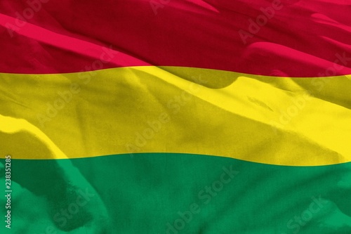 Waving Bolivia flag for using as texture or background  the flag is fluttering on the wind
