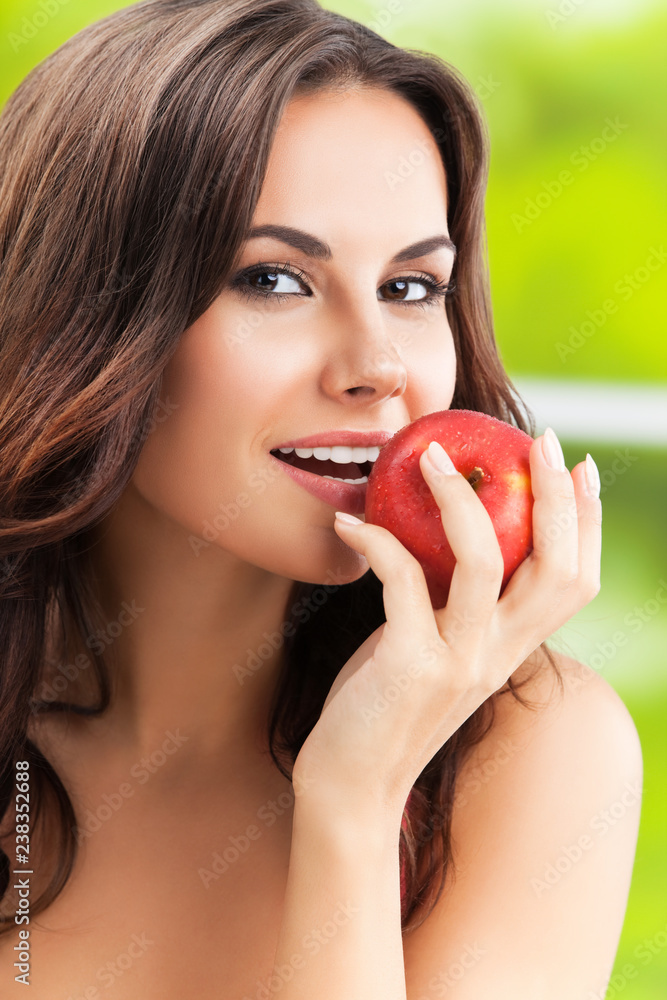 smiling woman with apple smiling woman with apple