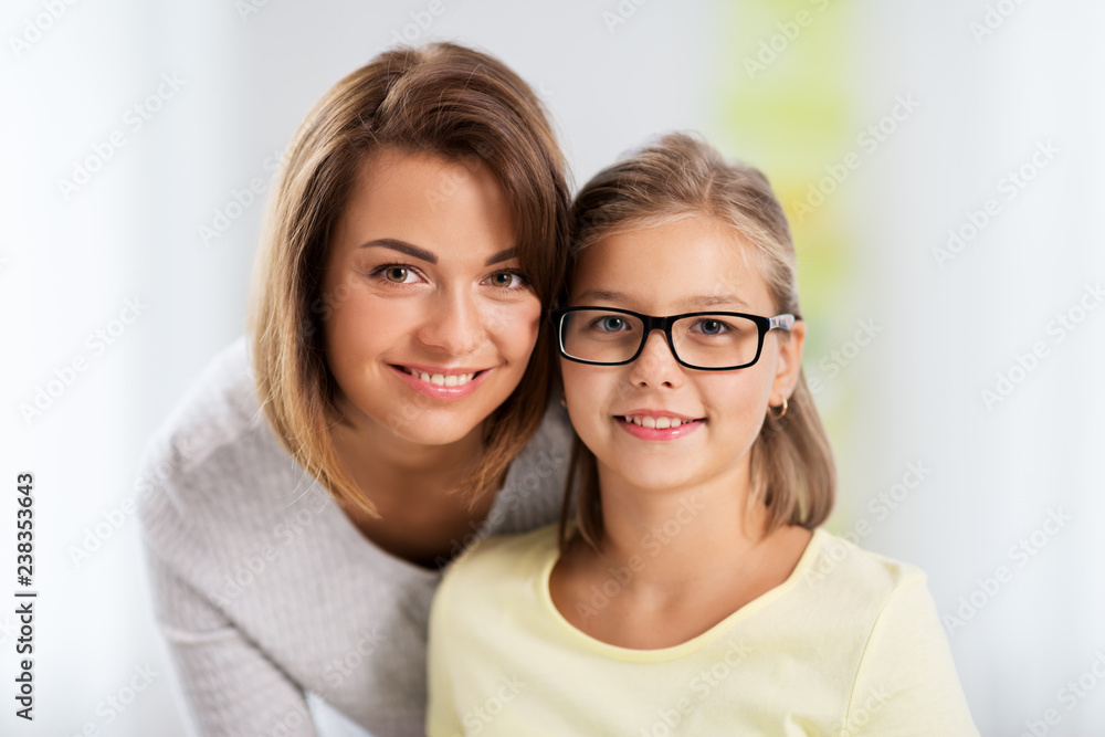 people and family concept - portrait of happy mother and daughter people and family concept - portrait of happy mother and daughter