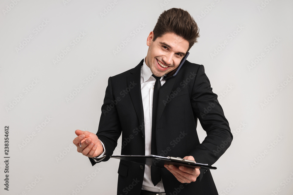 Busy business man wearing suit standing Busy business man wearing suit standing