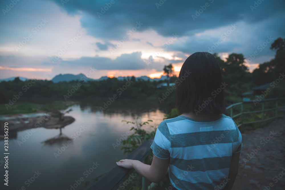 Happy young cute asian girl hipster backpack  women travelling looking at beautiful sky mountains scenery views 