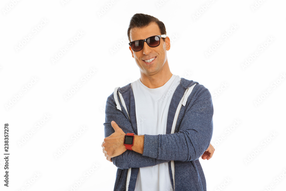 Pleasant happy confident man wearing stylish sunglasses Pleasant happy confident man wearing stylish sunglasses