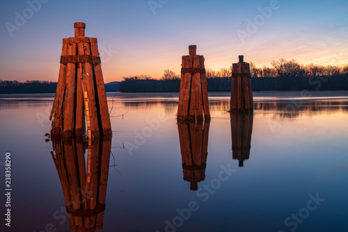 Group of three docking piles on Connecticut river