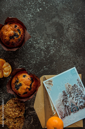 muffin chocolate on a dark table and cookies