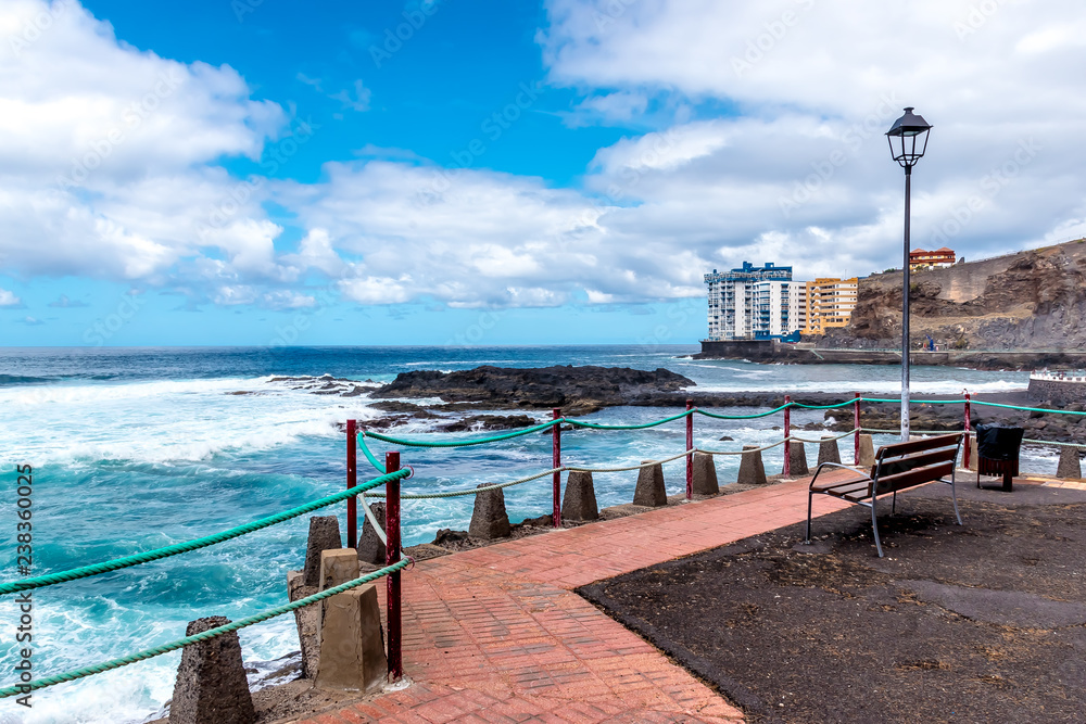 Mesa de Mar, Tenerife, Canaris - A beautiful place to relax on the rocky coastline overlooking a eleven-floor house, right on the sea, in Mesa de Mar in the north of Tenerife in October.