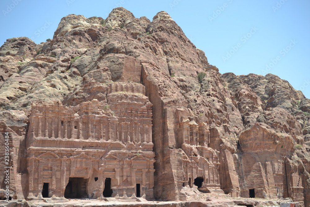 Ancient tombs in Petra, Jordan - ancient Nabatean city in red natural rock and with local bedouins