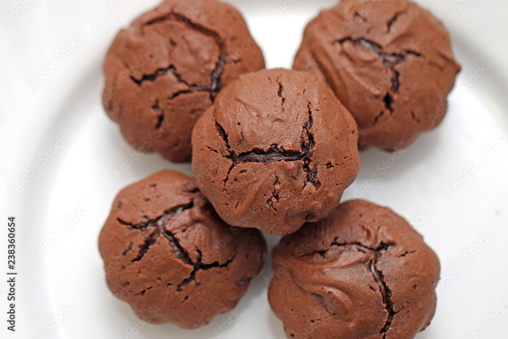 baking in the oven, blushing tasty cookies on the tray baking in the oven, blushing tasty cookies on the tray