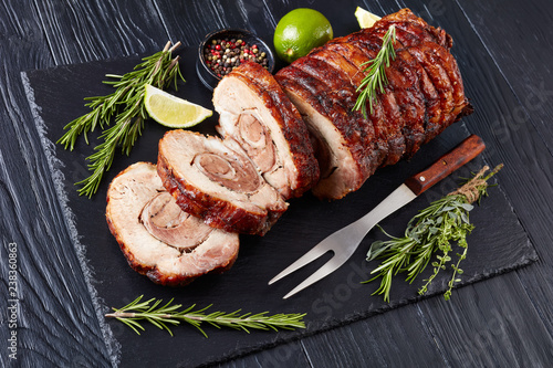 overhead view of sliced roast pork roulade photo