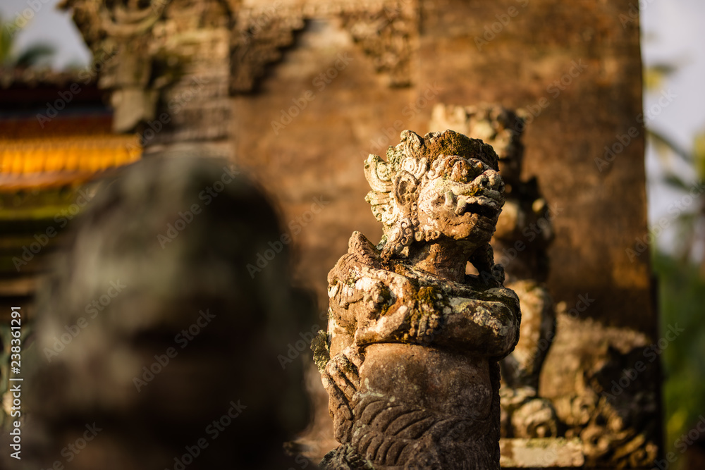 Stone carved demons protecting the staircase entrance of Pura Kehen hindu temple in Bali, Indonesia.
