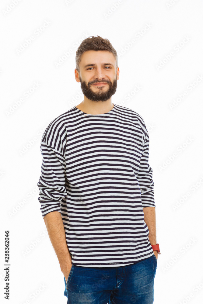 Delighted nice man putting his hands into the pockets Delighted nice man putting his hands into the pockets