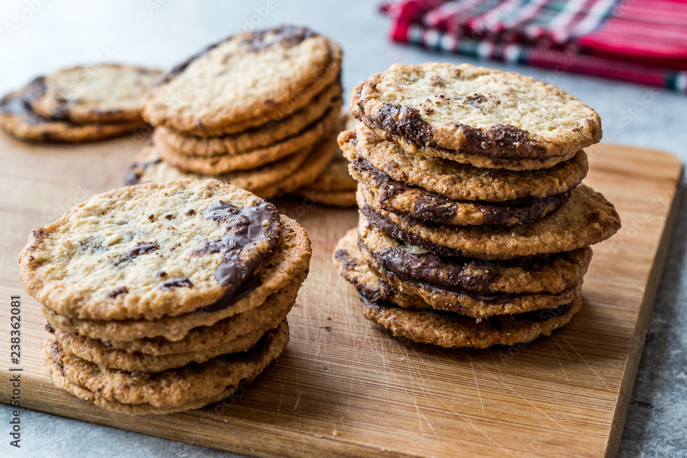 Classic Swedish Oatmeal Cookies with Chocolate on Wooden Board. Classic Swedish Oatmeal Cookies with Chocolate on Wooden Board.