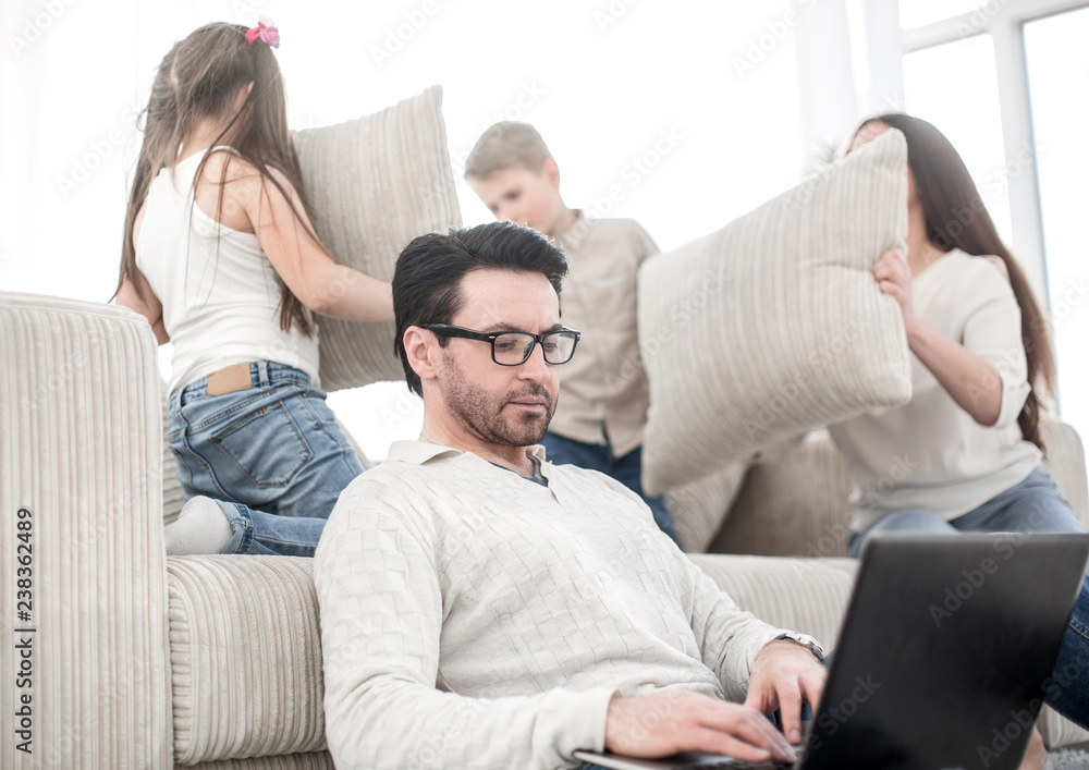 modern man work on a laptop at his home modern man work on a laptop at his home