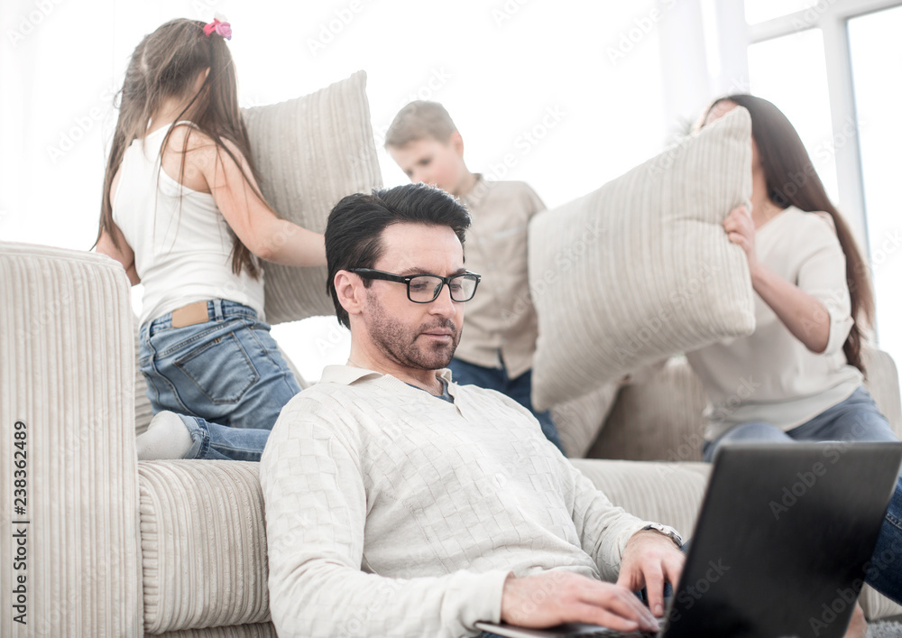 modern man work on a laptop at his home