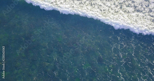Wallpaper Mural Aerial view beautiful of sea waves from drone. Stock image picture of blue color ocean water, wave, sea surface. Top view on turquoise waves, clear water surface texture. Top view, amazing nature Torontodigital.ca