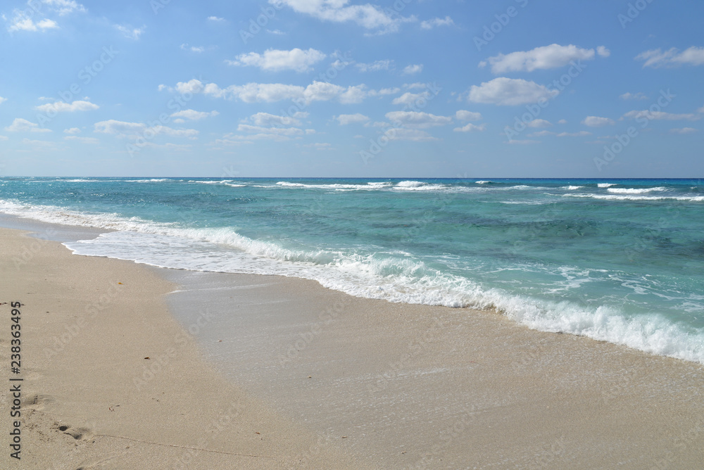Sand beach with blue sky