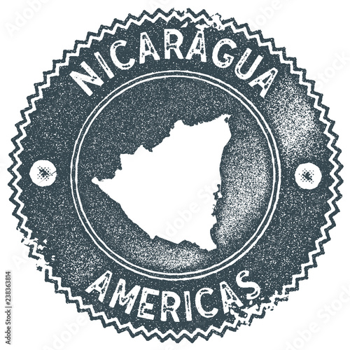 Nicaragua map vintage stamp. Retro style handmade label, badge or element for travel souvenirs. Dark blue rubber stamp with country map silhouette. Vector illustration.