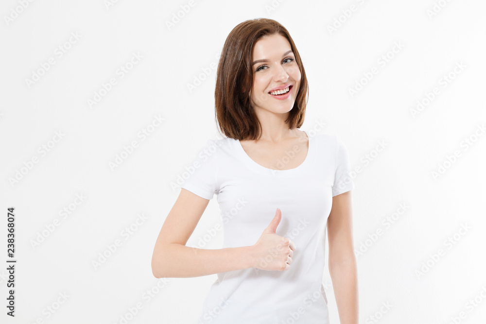 Young caucasian woman in template blank t shirt showing big thumb up isolated on white background. Happy and success concept. Copy space Young caucasian woman in template blank t shirt showing big thumb up isolated on white background. Happy and success concept. Copy space