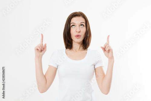 Young caucasian girl have good idea. Happy smiling woman isolated on white background. Copy space. Template and blank summer t shirt.