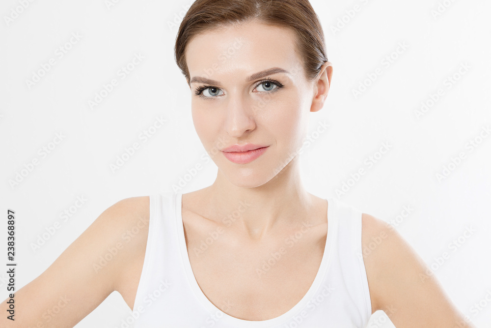 Young beautiful woman with closed eyes touching clean fresh face skin . Anti aging concept. Facial treatment . Cosmetology , Beauty and spa. Isolated on white Young beautiful woman with closed eyes touching clean fresh face skin . Anti aging concept. Facial treatment . Cosmetology , Beauty and spa. Isolated on white
