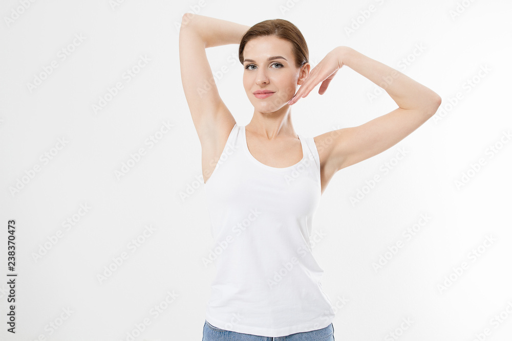 Blank template t shirt. Beauty Woman with perfect skin armpits and epilation isolated on white background. Laser hair removal. Brunette girl holding arms up and showing clean underarms. Copy space Blank template t shirt. Beauty Woman with perfect skin armpits and epilation isolated on white background. Laser hair removal. Brunette girl holding arms up and showing clean underarms. Copy space