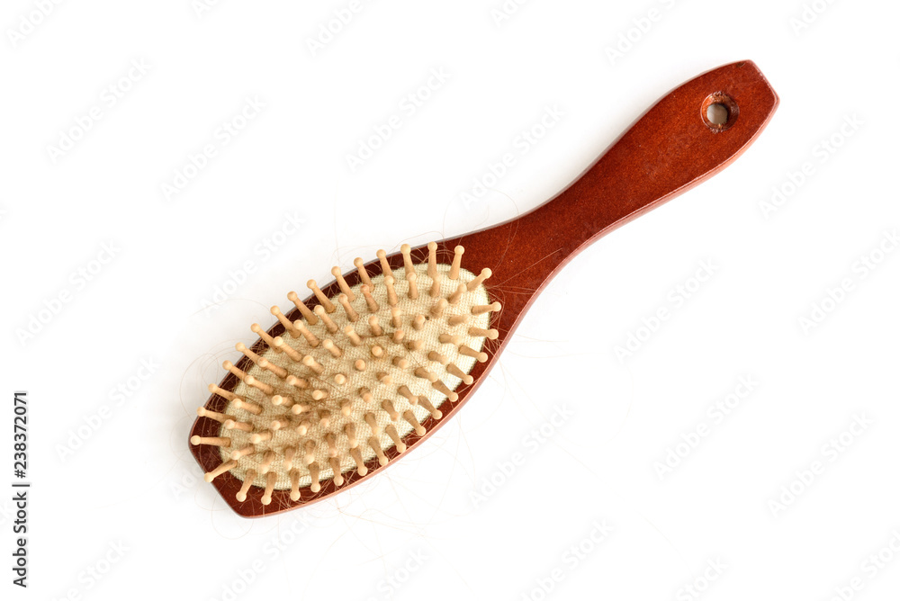 Wooden comb isolated on white background. Wooden comb isolated on white background.