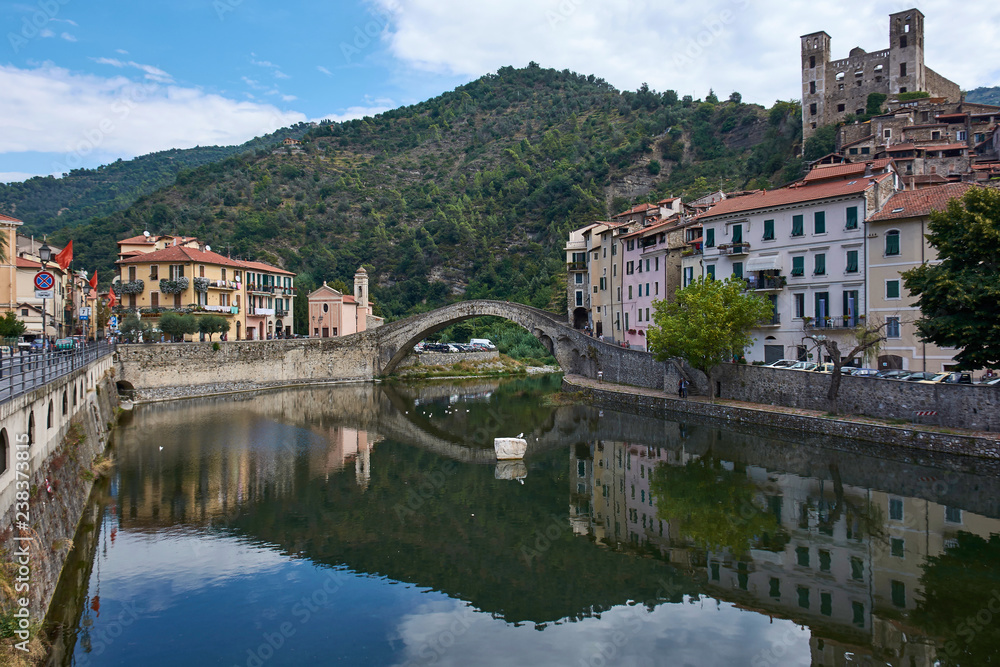 Italy. Dolceacqua. Nervia River and Humpback Bridge in the old town. Monet Bridge