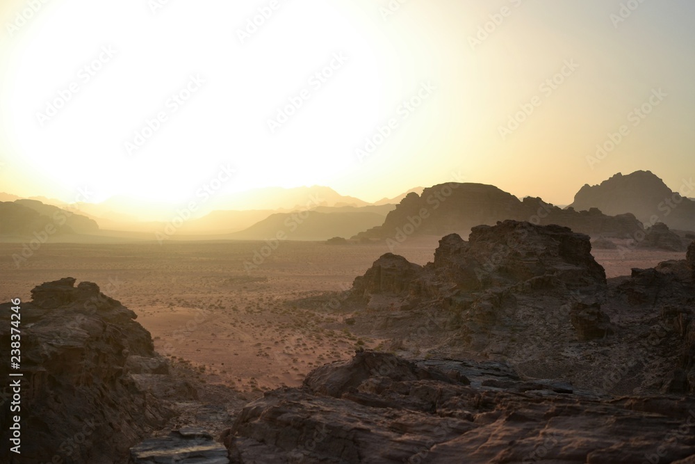 Sunset during Desert tour through sand dunes of Wadi Rum wilderness, Jordan, Middle East, hiking, climbing, driving