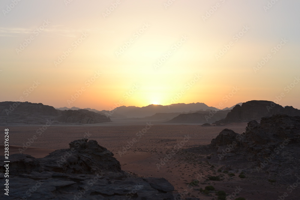 Sunset during Desert tour through sand dunes of Wadi Rum wilderness, Jordan, Middle East, hiking, climbing, driving