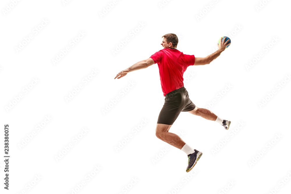 The fit caucasian young male handball player at studio on white background. Fit athlete isolated on white. The man in action, motion, movement. attack and defense concept