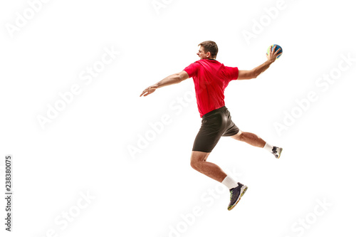 The fit caucasian young male handball player at studio on white background. Fit athlete isolated on white. The man in action  motion  movement. attack and defense concept