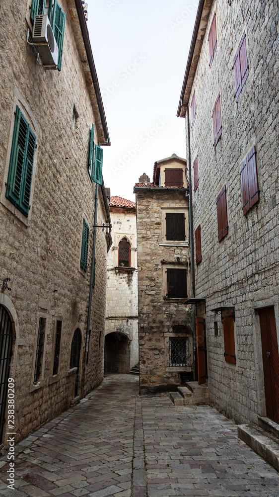 Beautiful narrow streets of the old European city. stone paved paths.