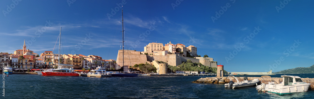 Port of Calvi with citadel in background (Corsica) - panoramic view Port of Calvi with citadel in background (Corsica) - panoramic view