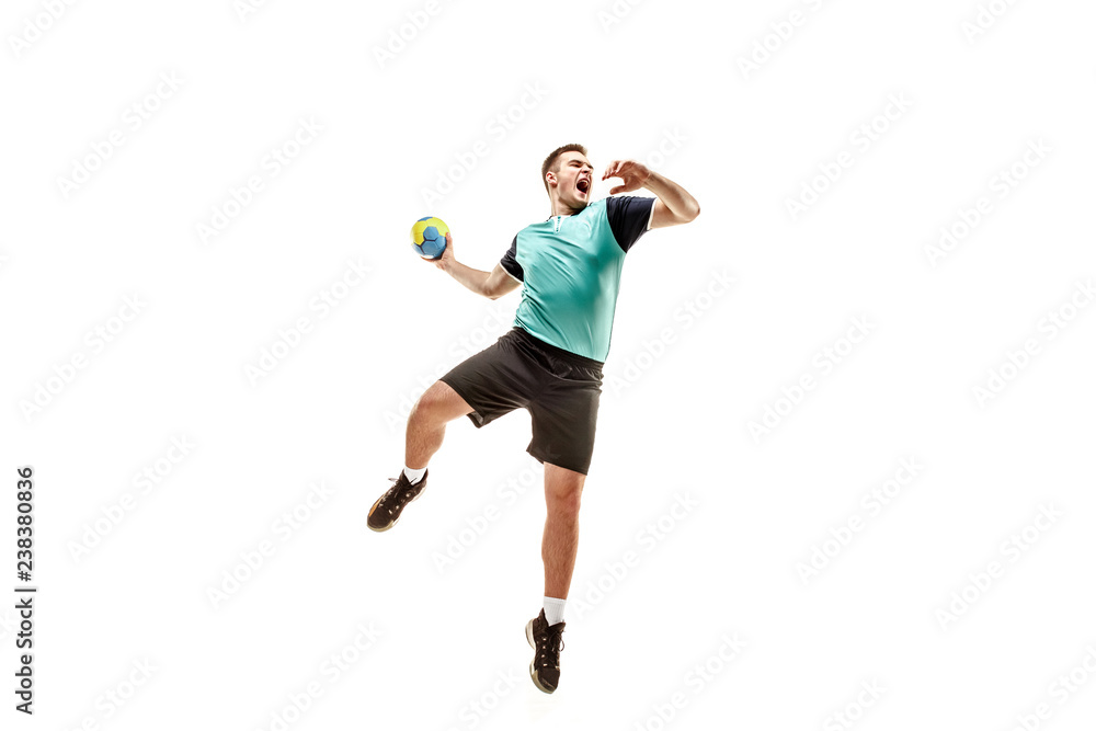 The fit caucasian young male handball player at studio on white background. Fit athlete isolated on white. The man in action, motion, movement. attack and defense concept - obrazy, fototapety, plakaty 