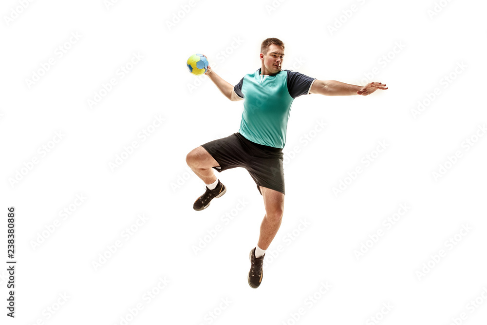 The fit caucasian young male handball player at studio on white background. Fit athlete isolated on white. The man in action, motion, movement. attack and defense concept The fit caucasian young male handball player at studio on white background. Fit athlete isolated on white. The man in action, motion, movement. attack and defense concept