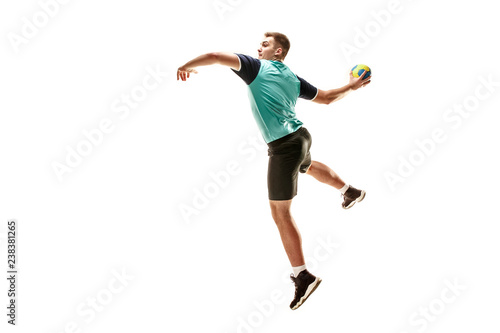 The fit caucasian young male handball player at studio on white background. Fit athlete isolated on white. The man in action, motion, movement. attack and defense concept © master1305