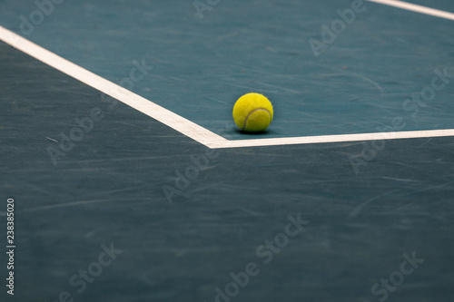 Tennis ball on a court