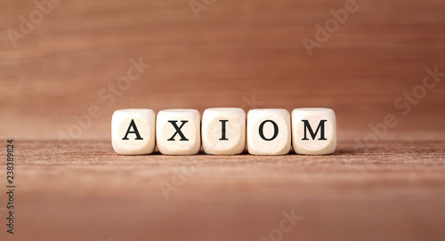 Word AXIOM made with wood building blocks