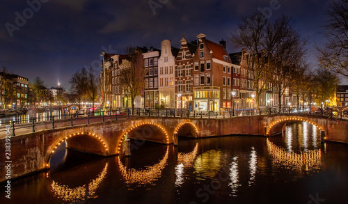 Canal houses by night photo