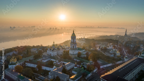 Skyline, Kiev city with beautiful morning sky. Pedestrian bridge. Left bank the Dnieper River.