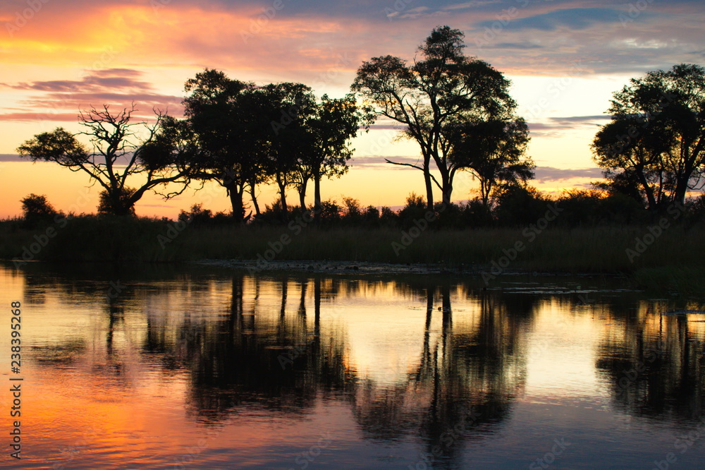 Sunset at Okawango river in Namibia in Africa