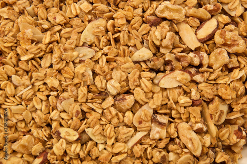 Looking down on home made, all natural, organic granola. The cereal fills the entire image.