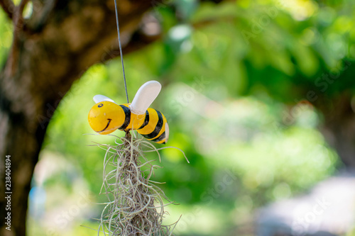 Statue of bee for garden decoration photo