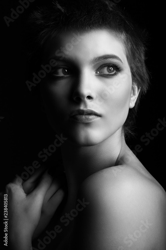 Black and white portrait of a beautiful teen girl.