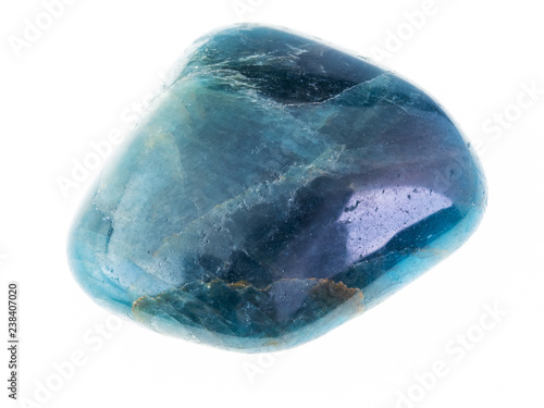 polished blue green apatite gem stone on white