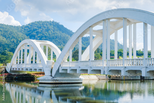 White Railway Bridge in Lamphun, Thailand © patpitchaya